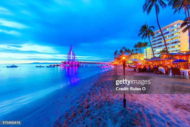 muelle vallarta - mexico beach night stock pictures, royalty-free photos & images