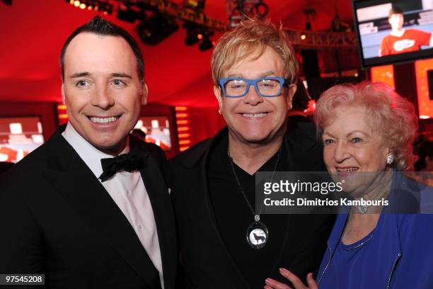 David Furnish, musician Sir Elton John, and actress Betty White attend the 18th Annual Elton John AIDS Foundation Oscar party held at Pacific Design...