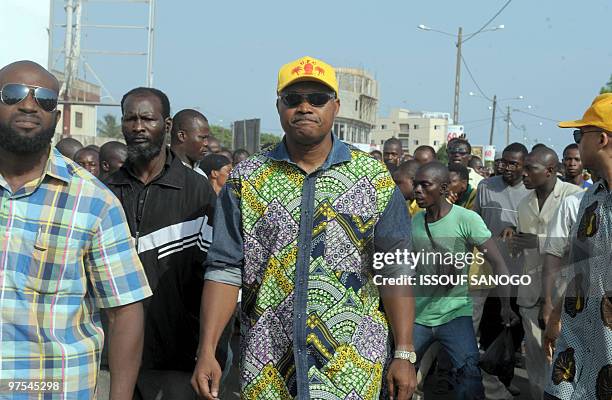 Jean-Pierre Fabre , Togogolese Opposition candidate and UFC secretary general march along with protesters on March 7, 2010 in Lome as the opposition...