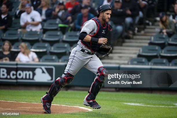 Yan Gomes of the Cleveland Indians chases after a wild pitch in the first inning against the Chicago White Sox at Guaranteed Rate Field on June 11,...