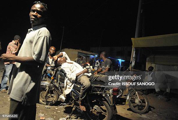 Supporters of Togolese Jean-Pierre Fabre, leader of the Union of Forces of Change , the main party of the divided opposition, and presidential...