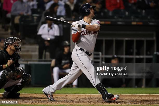 Lonnie Chisenhall of the Cleveland Indians hits a single in the fourth inning against the Chicago White Sox at Guaranteed Rate Field on June 11, 2018...