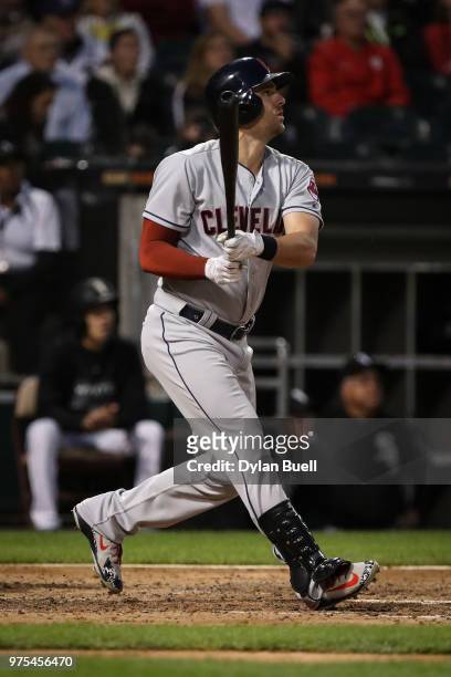 Lonnie Chisenhall of the Cleveland Indians hits a single in the fourth inning against the Chicago White Sox at Guaranteed Rate Field on June 11, 2018...