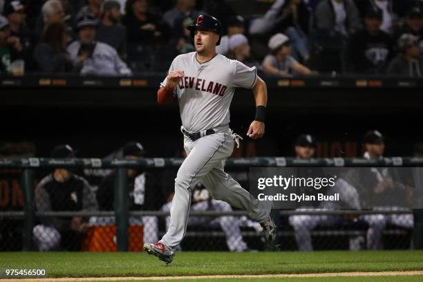 Lonnie Chisenhall of the Cleveland Indians runs to home plate in the fourth inning against the Chicago White Sox at Guaranteed Rate Field on June 11,...