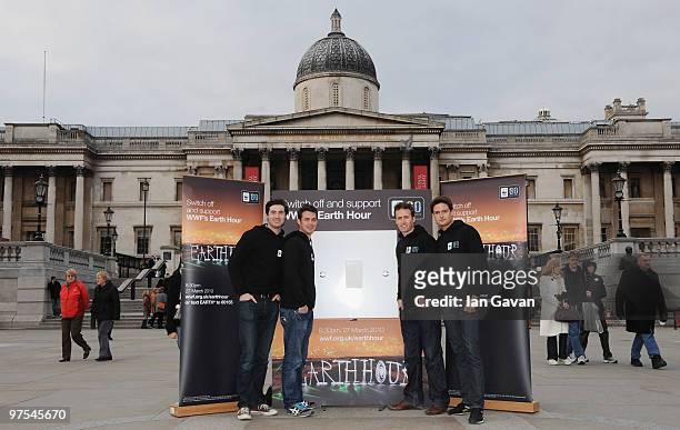 Ollie Bains, Jules Knight, Humphrey Berney and Steven Bowman of 'Blake' attend a photocall to promote WWF's Earth Hour in Trafalgar Square on March...