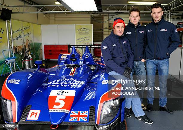 British Formula 1 driver Nigel Mansell poses with his sons Greg and Léo in front of a British car, the LMP1 Ginetta Zytek, on March 8, 2010 at the...