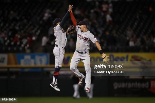 Francisco Lindor and Lonnie Chisenhall of the Cleveland Indians celebrate after beating the Chicago White Sox 4-0 at Guaranteed Rate Field on June...