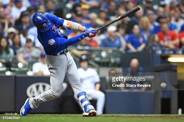 Kris Bryant of the Chicago Cubs at bat during a game against the Milwaukee Brewers at Miller Park on June 12, 2018 in Milwaukee, Wisconsin. The...