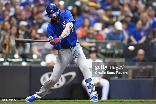 Kris Bryant of the Chicago Cubs at bat during a game against the Milwaukee Brewers at Miller Park on June 12, 2018 in Milwaukee, Wisconsin. The...