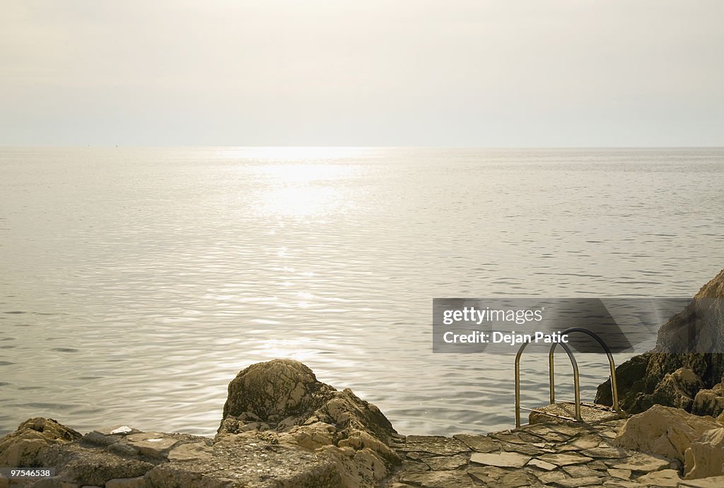 Swimming ladder on a rock by the Adriatic sea