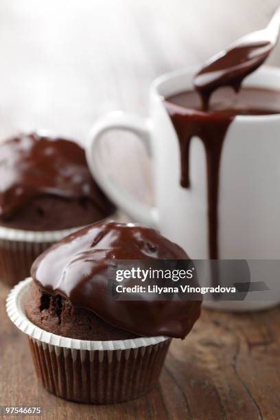 chocolate muffins with hot chocolate - chocolate muffin stock pictures, royalty-free photos & images