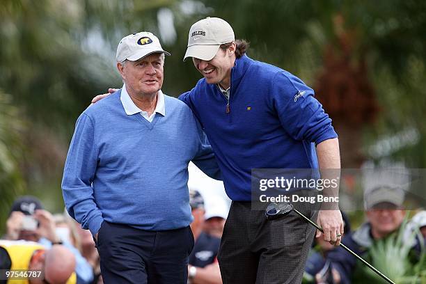 Tour legend Jack Nicklaus, L, and Super Bowl winning quarterback Drew Brees of the New Orleans Saints share a light moment after teeing off the first...