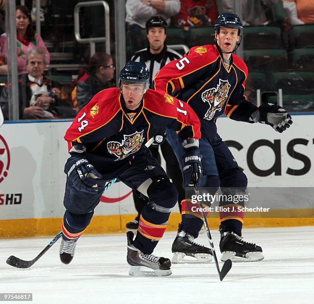 Radek Dvorak of the Florida Panthers skates on the ice with teammate Bryan Allen against the Philadelphia Flyers at the BankAtlantic Center on March...