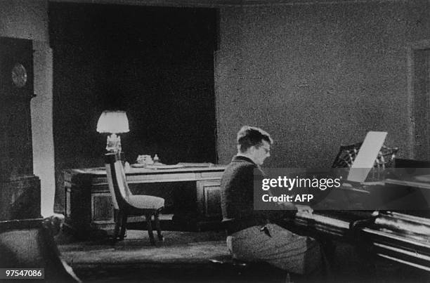 Caption of this picture released by Soviet official press agency Tass reads: ''Dmitri Dmitriyevich Shostakovich working over his famous Seventh...