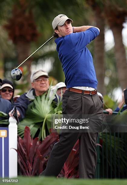 Super Bowl winning quarterback Drew Brees of the New Orleans Saints hits his tee shot on the first hole during the Honda Classic Kenny G Gold Pro-Am...