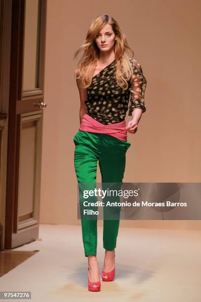 Model walks the runway during the Emmanuel Ungaro Ready to Wear show as part of the Paris Womenswear Fashion Week Fall/Winter 2011 at Hotel Westin on...