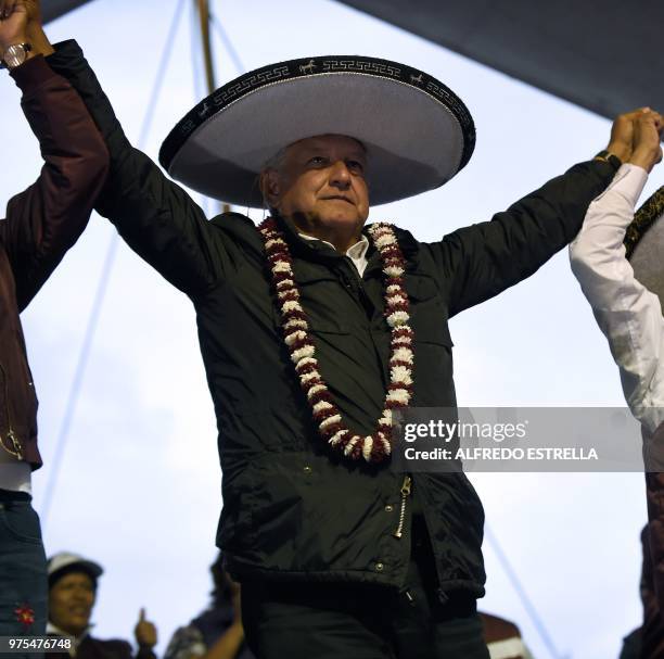 Mexican presidential candidate for the MORENA party, Andres Manuel Lopez Obrador, gestures during a campaign rally in Chimalhuacan, Mexico State, on...