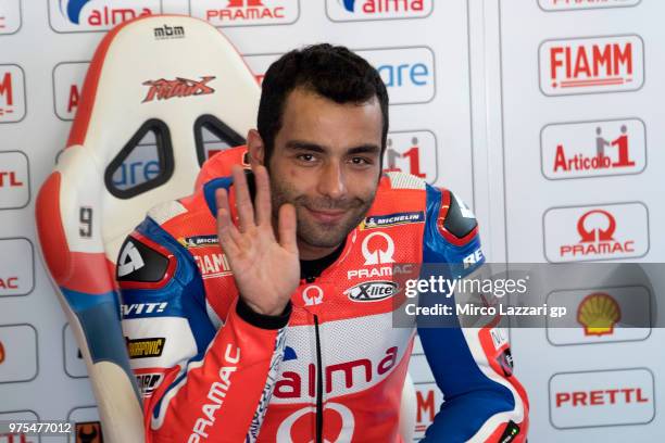 Danilo Petrucci of Italy and Alma Pramac Racing greets in box during the MotoGp of Catalunya - Free Practice at Circuit de Catalunya on June 15, 2018...