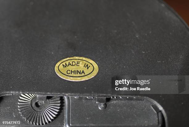 In this photo illustration, a Made in China tag is seen on an device on the day President Donald Trump announced tariffs on $50 billion of Chinese...