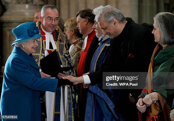 Queen Elizabeth II meets the Commonwealth Secretary-General Kamalesh Sharmaand his wife Babli as they attend the annual Commonwealth Day Observance...