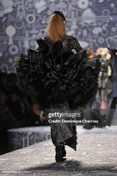 Model walks the runway during the Viktor & Rolf Ready to Wear Show as part of the Paris womens wear Fashion Week Fall Winter 2011 at Espace Ephemere...