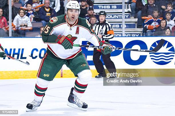 Andrew Brunette of the Minnesota Wild defends the zone against the Edmonton Oilers at Rexall Place on March 5, 2010 in Edmonton, Alberta, Canada. The...
