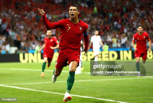 Cristiano Ronaldo of Portugal celebrates after scoring a penalty for his team's first goal during the 2018 FIFA World Cup Russia group B match...