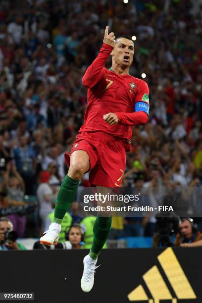 Cristiano Ronaldo of Portugal celebrates after scoring a penalty for his team's first goal during the 2018 FIFA World Cup Russia group B match...