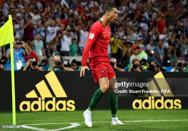 Cristiano Ronaldo of Portugal celebrates after scoring a penalty for his team's first goal during the 2018 FIFA World Cup Russia group B match...