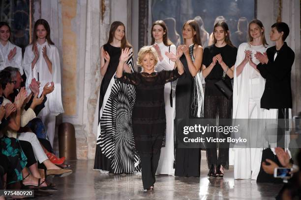 Designer Alberta Ferretti acknowledges the applause of the audience at the runway at the Alberta Ferretti show during Milan Men's Fashion Week...