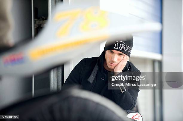 Toni Elias of Spain and Gresini Racing Moto2 looks the 125 cc. Bike during the third day of testing at Circuito de Jerez on March 8, 2010 in Jerez de...