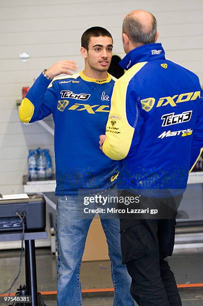 Raffaele De Rosa of Italy and Tech 3 Racing speaks with his mechanic during the third day of testing at Circuito de Jerez on March 8, 2010 in Jerez...