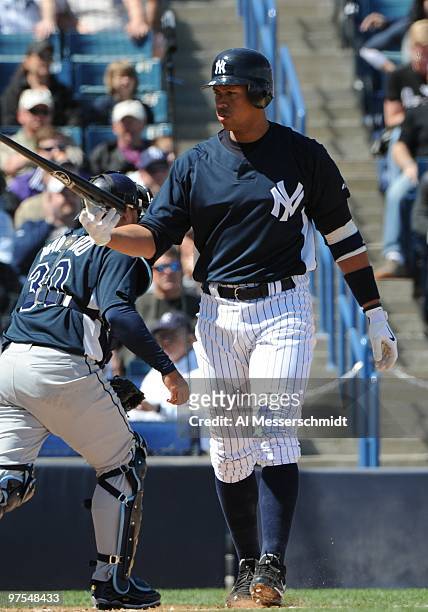 Infielder Alex Rodriguez of the New York Yankees tosses his bat after striking out against the Tampa Bay Rays March 5, 2010 at the George M....