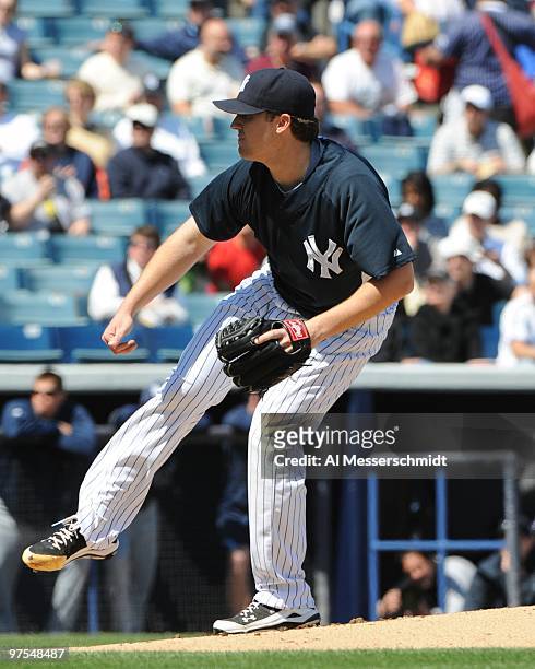 Phil Hughes of the New York Yankees pitches against the Tampa Bay Rays March 5, 2010 at the George M. Steinbrenner Field in Tampa, Florida.