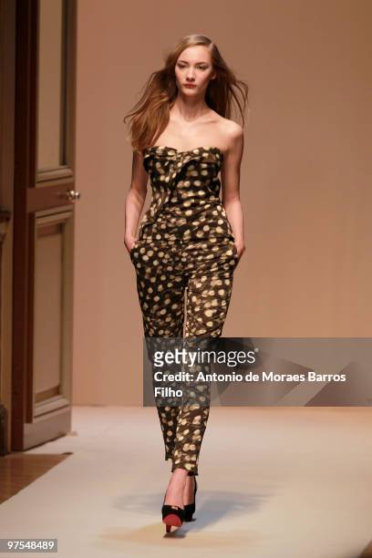 Model walks the runway during the Emmanuel Ungaro Ready to Wear show as part of the Paris Womenswear Fashion Week Fall/Winter 2011 at Hotel Westin on...