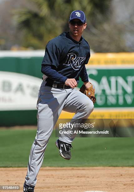 Infielder Ben Zobrist of the Tampa Bay Rays warms up before play against the New York Yankees March 5, 2010 at the George M. Steinbrenner Field in...