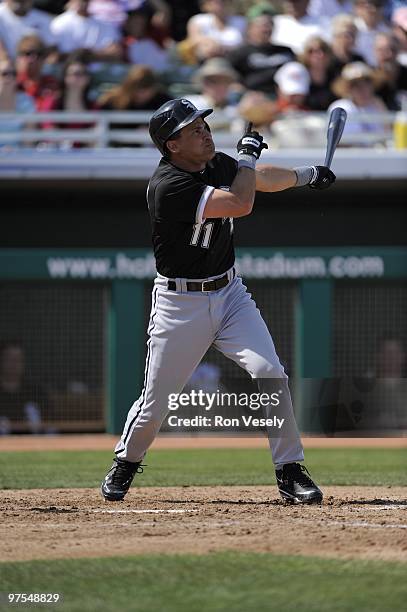 Omar Vizquel of the Chicago White Sox bats against the Chicago Cubs on March 6, 2010 at HoHoKam Park in Mesa, Arizona.