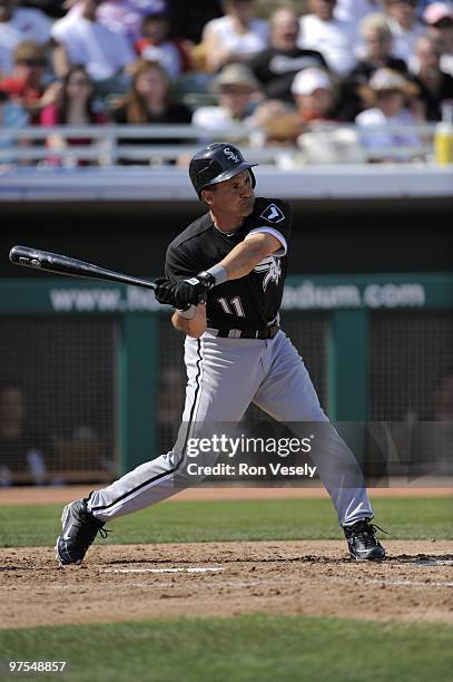 Omar Vizquel of the Chicago White Sox bats against the Chicago Cubs on March 6, 2010 at HoHoKam Park in Mesa, Arizona.