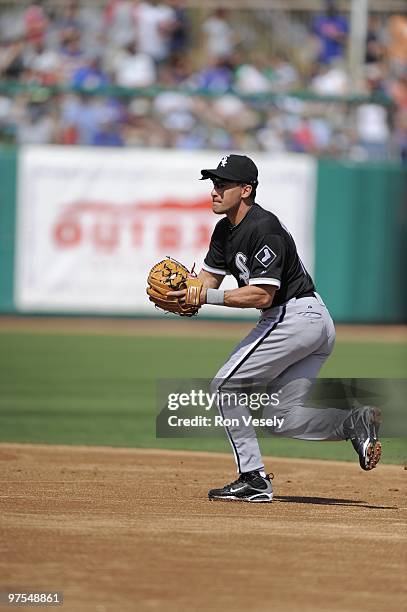 Omar Vizquel of the Chicago White Sox fields against the Chicago Cubs on March 6, 2010 at HoHoKam Park in Mesa, Arizona.