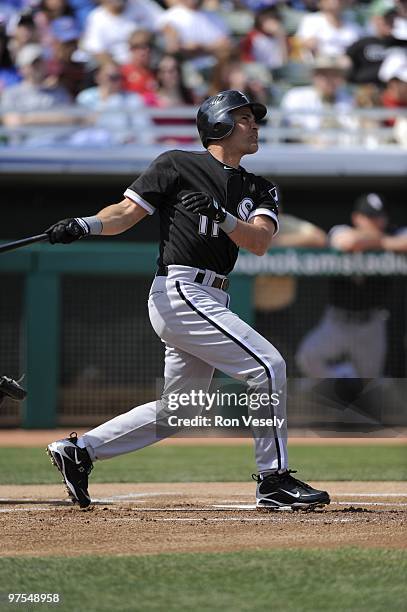 Omar Vizquel of the Chicago White Sox bats against the Chicago Cubs on March 6, 2010 at HoHoKam Park in Mesa, Arizona.