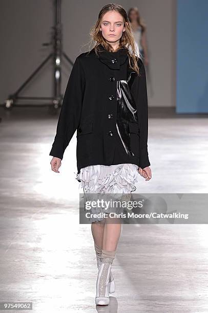 Model walks down the runway during the Jonathan Saunders fashion show, part of London Fashion Week, London on February 23, 2010 in London, England.