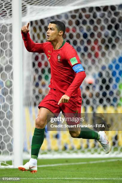 Cristiano Ronaldo of Portugal celebrates scoring his side's first goal, from a penalty, during the 2018 FIFA World Cup Russia group B match between...