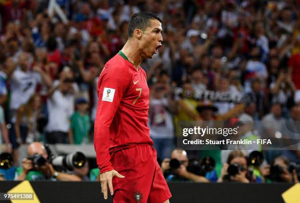 Cristiano Ronaldo of Portugal celebrates scoring his side's first goal, from a penalty, during the 2018 FIFA World Cup Russia group B match between...