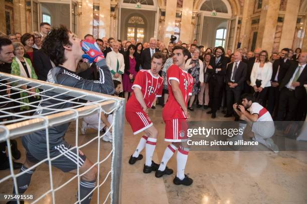 May 2018, Germany, Stuttgart: Dancers directed by choreographer Eric Gauthier performing during a reception marking the 70th birthday of Premier of...