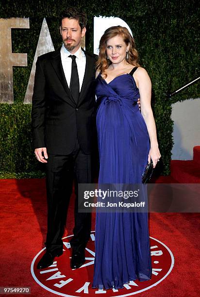 Darren Le Gallo and Amy Adams arrive at the 2010 Vanity Fair Oscar Party held at Sunset Tower on March 7, 2010 in West Hollywood, California.