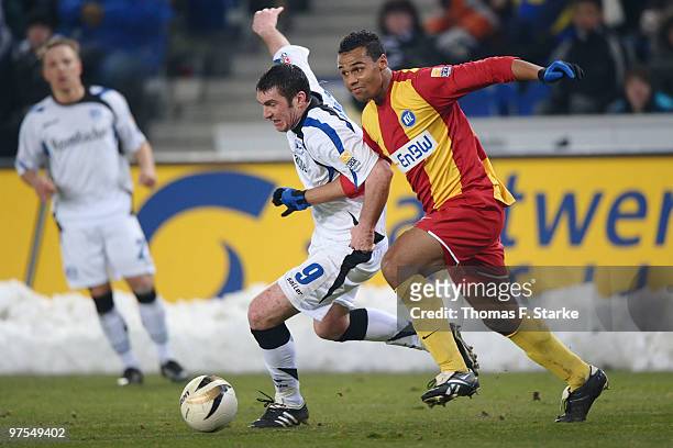 Marvin Matip of Karlsruhe and Pavel Fort of Bielefeld fight for the ball during the Second Bundesliga match between Arminia Bielefeld and Karlsruher...