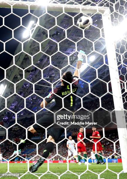 Goalkeeper Rui Patricio of Portugal fails to save a shot from Isco of Spain as ball hits the bar and bounces on the line during the 2018 FIFA World...