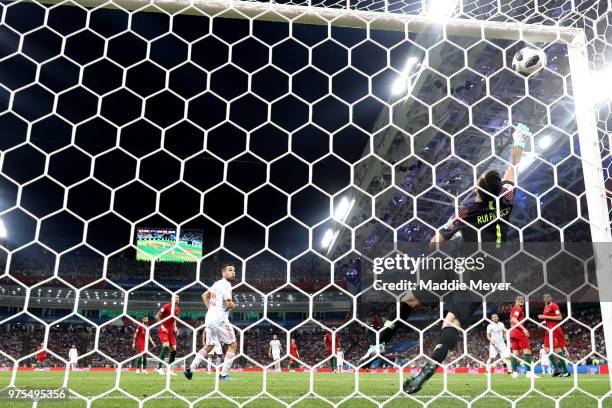 Goalkeeper Rui Patricio of Portugal fails to save a shot from Isco of Spain as ball hits the bar and bounces on the line during the 2018 FIFA World...