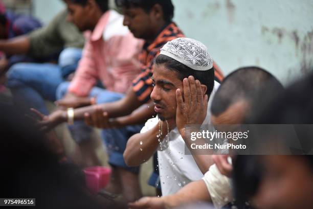 Nepalese Muslims washes their hands, face and feet before offering ritual prayers during last friday of Ramadan at Nepali Jame mosque at Kathmandu,...