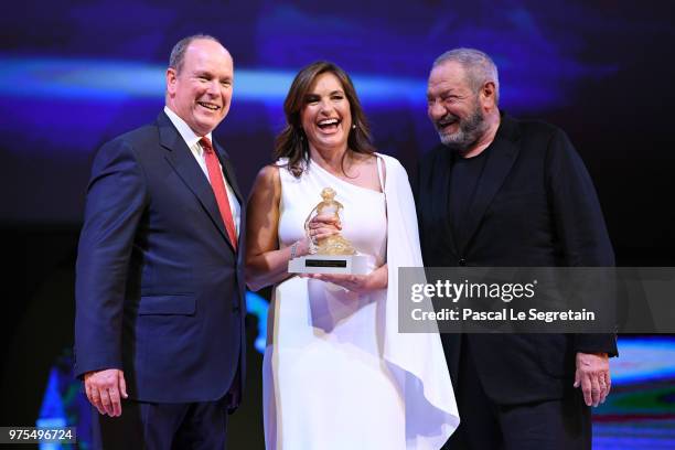 Mariska Hargitay poses with the Honorary Golden Nymph awards with Prince Albert II of Monaco and Dick Wolf during the opening ceremony of the 58th...